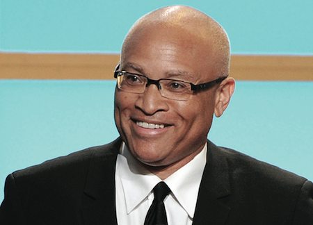 In this Monday, June 10, 2013, photo, Larry Wilmore accepts the best talk show award for “The Daily Show with Jon Stewart” at the Critics’ Choice Television Awards in the Beverly Hilton Hotel in Beverly Hills, Calif. (Photo by Frank Micelotta/ Invision/AP)