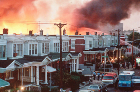 Row houses in Philadelphia burn after officials dropped a bomb on the MOVE house in this May 1985 photo from files. Ramona Africa, the lone adult survivor of the May 13, 1985 fire, and two other MOVE members sued the city of Philadelphia, and the former police and fire commissioners for financial damages in what was the first trial in court to address the MOVE bombing. Photo: AP/Wide World photos