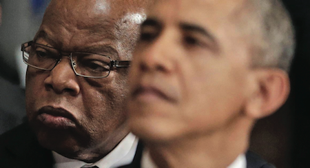 Rep. John Lewis, D-Ga., sits behind President Barack Obama at a memorial ceremony for the late former Speaker of the House of Representatives Thomas S. Foley at the Statuary Hall on Capitol Hill in Washington, Tuesday, Oct. 29, 2013. (AP Photo/Pablo Martinez Monsivais)