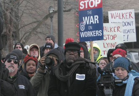 A crowd of about 200 people and union members gather in frigid temperatures in downtown Milwaukee, Wisconsin February 23, 2015. (Photo by Reuters/Brendan O'brien)