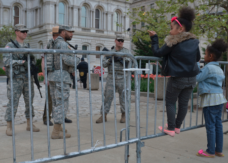 Two young girls talk to national guardsmen outside of city hall in Baltimore, Md., on Friday, May 1. (Freddie Allen/NNPA News Wire Service)