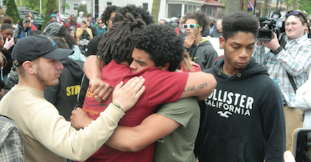Protesters mourn Tony Robinson during a protest this week. Photo by Steven Potter