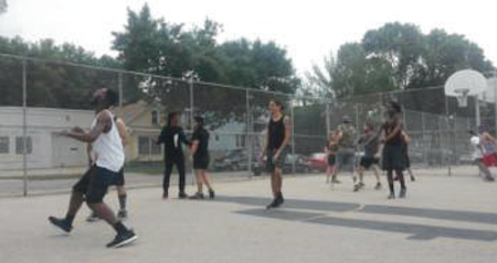Milwaukee bands Rio Turbo and New Age Narcissism (NAN) play against each other in one game of basketball.