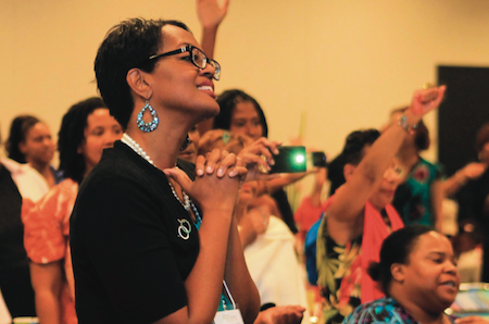 Women listen to keynote speaker Queen Afua at last year’s Black Women’s Wellness Day. Photo by Hedi Rudd